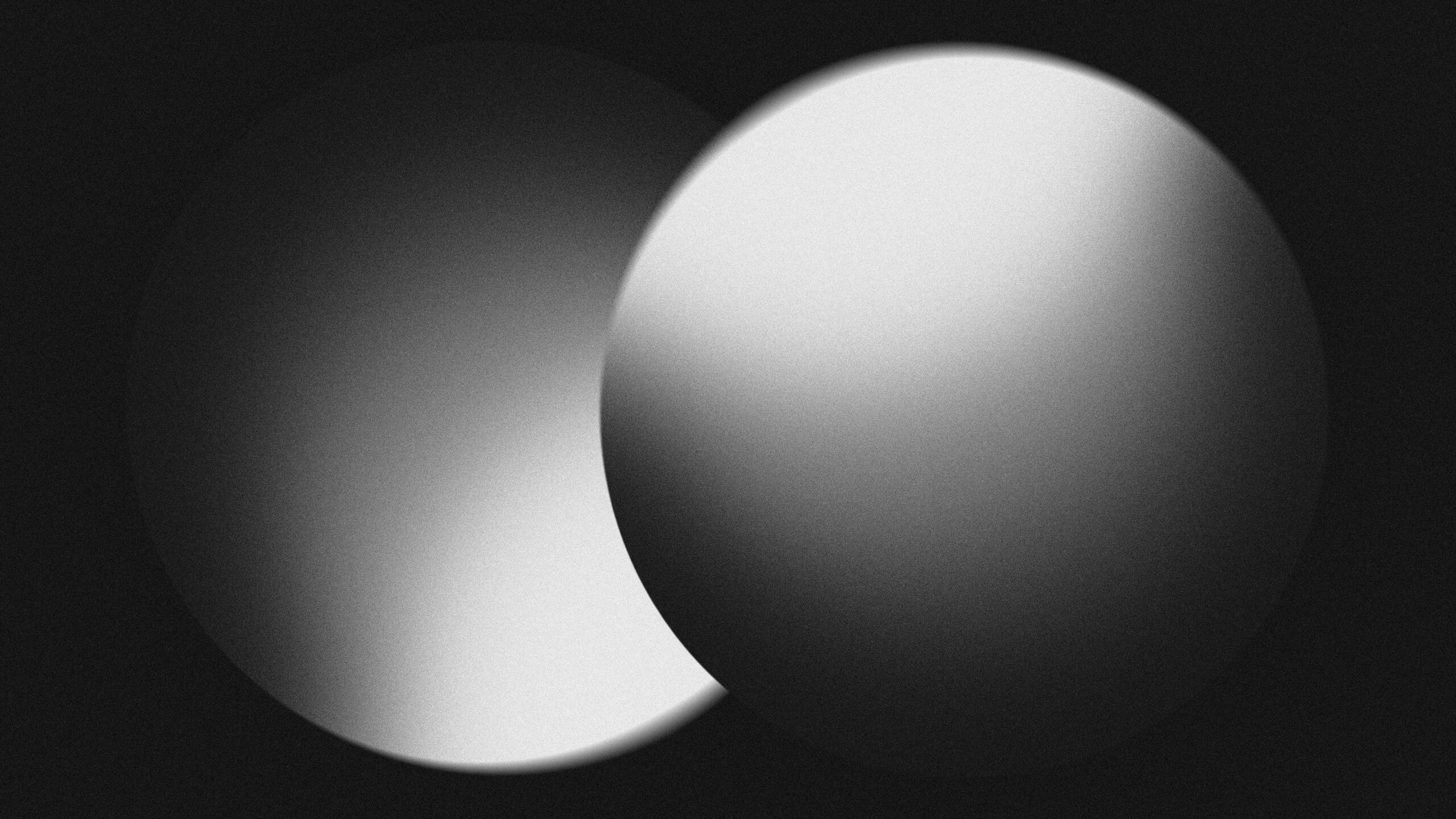 dos-esferas-superpuestas-con-un-juego-de-luz-y-sombra-en-monocromatico